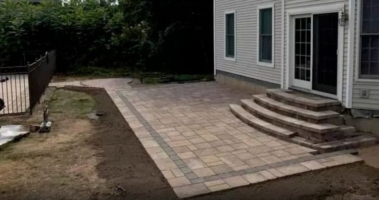 Paver patio with curved entry steps